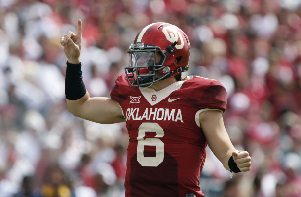 NORMAN, OK - OCTOBER 3:  Quarterback Baker Mayfield #6 of the Oklahoma Sooners yells a play against the West Virginia Mountaineers October 3, 2015 at Gaylord Family-Oklahoma Memorial Stadium in Norman, Oklahoma. Oklahoma defeated West Virginia 44-24.(Photo by Brett Deering/Getty Images)